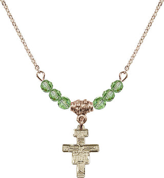 18" Hamilton Gold Plated Necklace with 4mm Peridot Crystal Beads featuring a 14kt Gold Filled San Damiano Crucifix Medal.
