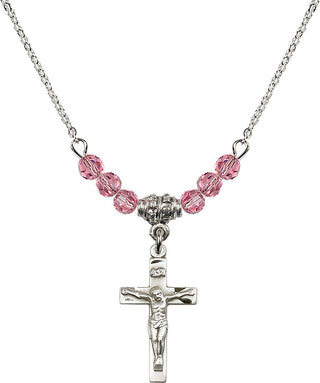 18" Rhodium Plated Necklace with 4mm Rose Crystal Beads featuring a Sterling Silver Crucifix Medal.