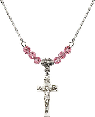 18" Rhodium Plated Necklace with 4mm Rose Crystal Beads featuring a Sterling Silver Crucifix Medal.
