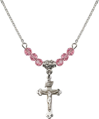 18" Rhodium Plated Necklace with 4mm Rose Crystal Beads featuring a Sterling Silver Crucifix Medal.