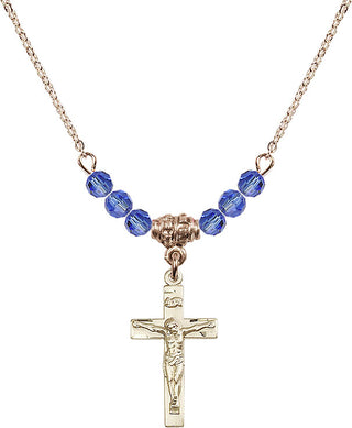 18" Hamilton Gold Plated Necklace with 4mm Sapphire Crystal Beads featuring a 14kt Gold Filled Crucifix Medal.