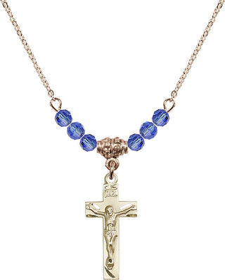 18" Hamilton Gold Plated Necklace with 4mm Sapphire Crystal Beads featuring a 14kt Gold Filled Crucifix Medal.