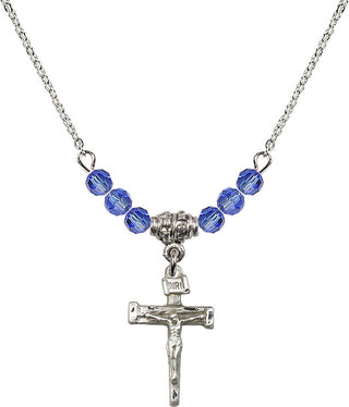 18" Rhodium Plated Necklace with 4mm Sapphire Crystal Beads featuring a Sterling Silver Nail Crucifix Medal.