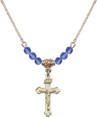 18" Hamilton Gold Plated Necklace with 4mm Sapphire Crystal Beads featuring a 14kt Gold Filled Crucifix Medal.