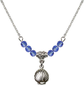 18" Rhodium Plated Necklace with 4mm Sapphire Crystal Beads featuring a Sterling Silver Shell Medal.