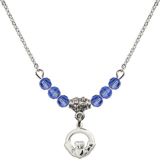 18" Rhodium Plated Necklace with 4mm Sapphire Crystal Beads featuring a Sterling Silver Claddagh Medal.