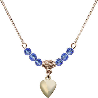 18" Hamilton Gold Plated Necklace with 4mm Sapphire Crystal Beads featuring a 14kt Gold Filled Heart Medal.