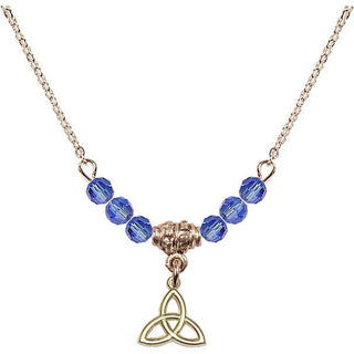 18" Hamilton Gold Plated Necklace with 4mm Sapphire Crystal Beads featuring a 14kt Gold Filled Trinity Irish Knot Medal.