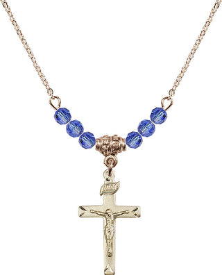 18" Hamilton Gold Plated Necklace with 4mm Sapphire Crystal Beads featuring a 14kt Gold Filled Crucifix Medal.