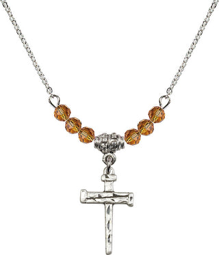 18" Rhodium Plated Necklace with 4mm Topaz Crystal Beads featuring a Sterling Silver Nail Cross Medal.