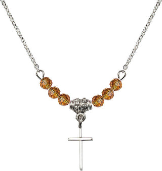 18" Rhodium Plated Necklace with 4mm Topaz Crystal Beads featuring a Sterling Silver Cross Medal.