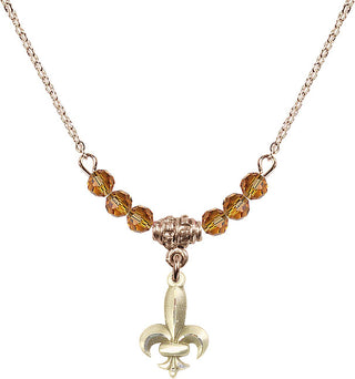 18" Hamilton Gold Plated Necklace with 4mm Topaz Crystal Beads featuring a 14kt Gold Filled Fleur de Lis Medal.