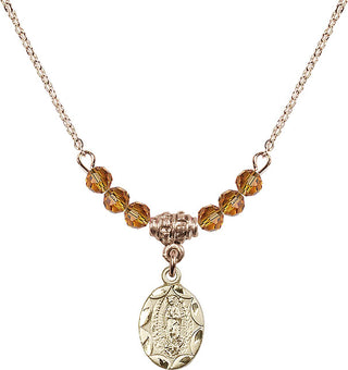 18" Hamilton Gold Plated Necklace with 4mm Topaz Crystal Beads featuring a 14kt Gold Filled Our Lady of Guadalupe Medal.