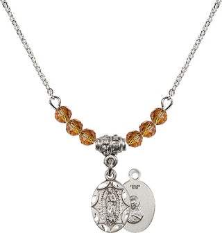 18" Rhodium Plated Necklace with 4mm Topaz Crystal Beads featuring a Sterling Silver Our Lady of Guadalupe Medal.