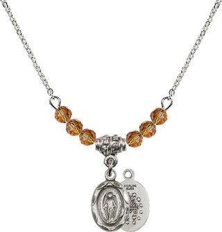 18" Rhodium Plated Necklace with 4mm Topaz Crystal Beads featuring a Sterling Silver Miraculous Medal.
