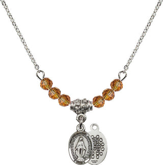 18" Rhodium Plated Necklace with 4mm Topaz Crystal Beads featuring a Sterling Silver Miraculous Medal.