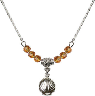 18" Rhodium Plated Necklace with 4mm Topaz Crystal Beads featuring a Sterling Silver Shell Medal.