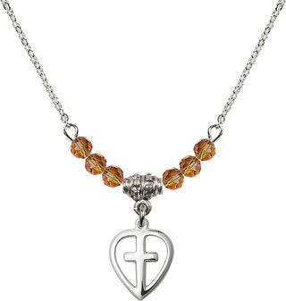 18" Rhodium Plated Necklace with 4mm Topaz Crystal Beads featuring a Sterling Silver Heart / Cross Medal.
