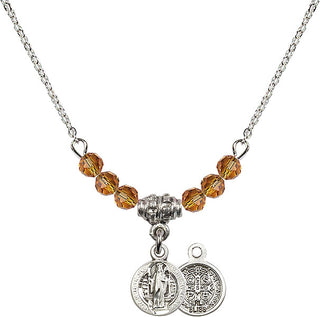 18" Rhodium Plated Necklace with 4mm Topaz Crystal Beads featuring a Sterling Silver Saint Benedict Medal.
