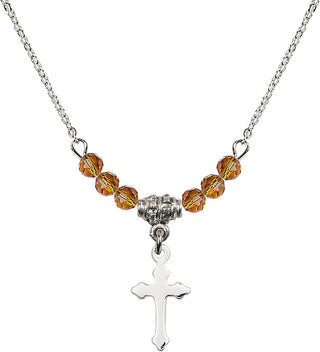 18" Rhodium Plated Necklace with 4mm Topaz Crystal Beads featuring a Sterling Silver Cross Medal.