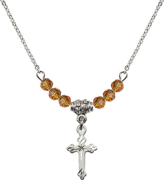 18" Rhodium Plated Necklace with 4mm Topaz Crystal Beads featuring a Sterling Silver Cross Medal.