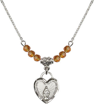 18" Rhodium Plated Necklace with 4mm Topaz Crystal Beads featuring a Sterling Silver Miraculous Heart Medal. Engraved Catholic Saint Jewelry