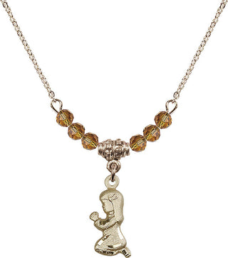 18" Hamilton Gold Plated Necklace with 4mm Topaz Crystal Beads featuring a 14kt Gold Filled Praying Girl Medal.