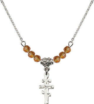 18" Rhodium Plated Necklace with 4mm Topaz Crystal Beads featuring a Sterling Silver Greek Orthadox Cross Medal.