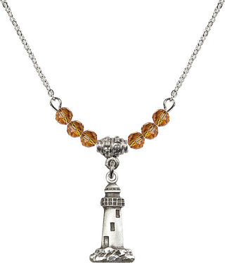 18" Rhodium Plated Necklace with 4mm Topaz Crystal Beads featuring a Sterling Silver Lighthouse Medal.