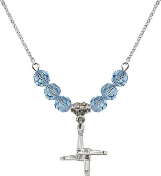 18" Rhodium Plated Necklace with 4mm Aqua Crystal Beads featuring a Sterling Silver Saint Brigid Cross Medal.