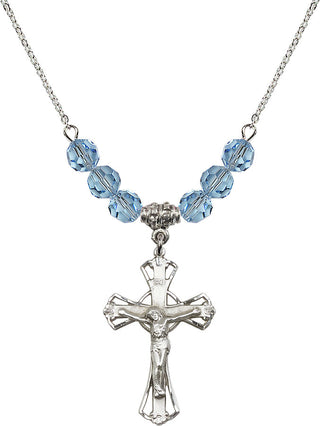 18" Rhodium Plated Necklace with 4mm Aqua Crystal Beads featuring a Sterling Silver Crucifix Medal.