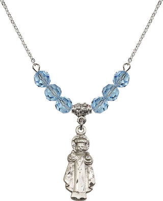 18" Rhodium Plated Necklace with 4mm Aqua Crystal Beads featuring a Sterling Silver Infant of Prague Medal.