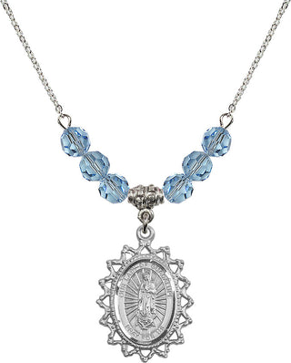 18" Rhodium Plated Necklace with 4mm Aqua Crystal Beads featuring a Sterling Silver Our Lady of Guadalupe Medal.