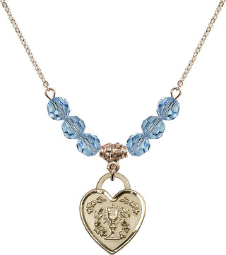 18" Hamilton Gold Plated Necklace with 4mm Aqua Crystal Beads featuring a 14kt Gold Filled Communion Heart Medal. Engraved Catholic Saint Jewelry