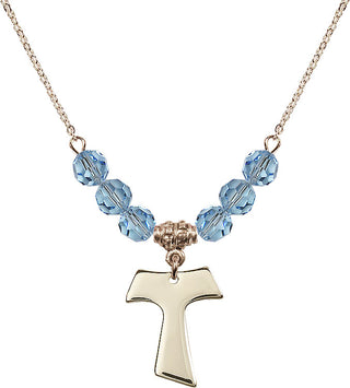18" Hamilton Gold Plated Necklace with 4mm Aqua Crystal Beads featuring a 14kt Gold Filled Tau Cross Medal.