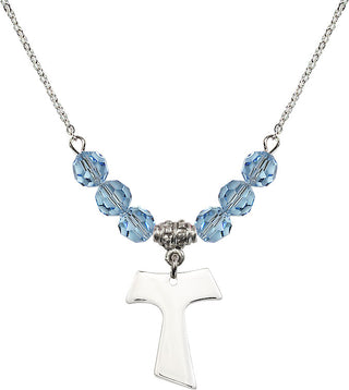 18" Rhodium Plated Necklace with 4mm Aqua Crystal Beads featuring a Sterling Silver Tau Cross Medal.