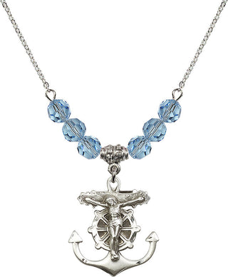 18" Rhodium Plated Necklace with 4mm Aqua Crystal Beads featuring a Sterling Silver Anchor Crucifix Medal.