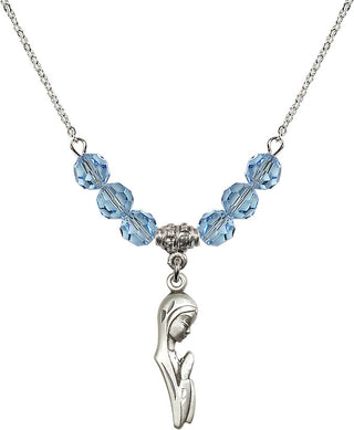 18" Rhodium Plated Necklace with 4mm Aqua Crystal Beads featuring a Sterling Silver Madonna Medal.