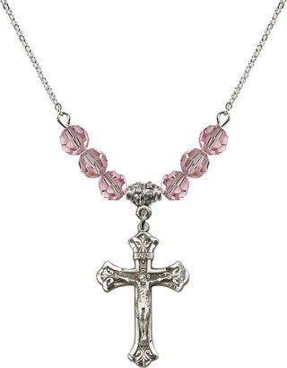 18" Rhodium Plated Necklace with 4mm Light Rose Crystal Beads featuring a Sterling Silver Crucifix Medal.