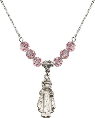 18" Rhodium Plated Necklace with 4mm Light Rose Crystal Beads featuring a Sterling Silver Infant of Prague Medal.