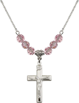18" Rhodium Plated Necklace with 4mm Light Rose Crystal Beads featuring a Sterling Silver Crucifix Medal.