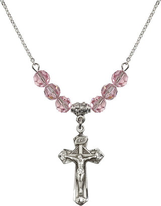18" Rhodium Plated Necklace with 4mm Light Rose Crystal Beads featuring a Sterling Silver Crucifix Medal.