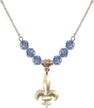18" Hamilton Gold Plated Necklace with 4mm Light Sapphire Crystal Beads featuring a 14kt Gold Filled Fleur de Lis Medal.