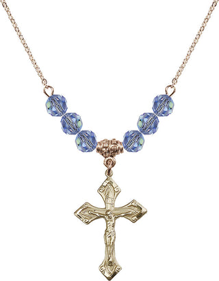 18" Hamilton Gold Plated Necklace with 4mm Light Sapphire Crystal Beads featuring a 14kt Gold Filled Crucifix Medal.