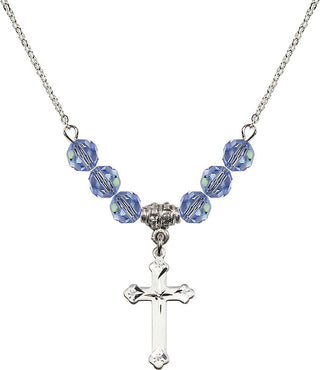 18" Rhodium Plated Necklace with 4mm Light Sapphire Crystal Beads featuring a Sterling Silver Cross Medal.