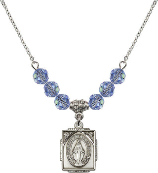18" Rhodium Plated Necklace with 4mm Light Sapphire Crystal Beads featuring a Sterling Silver Miraculous Medal. Engraved Catholic Saint Jewelry