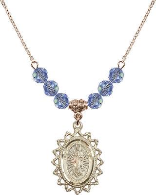 18" Hamilton Gold Plated Necklace with 4mm Light Sapphire Crystal Beads featuring a 14kt Gold Filled Our Lady of Guadalupe Medal.