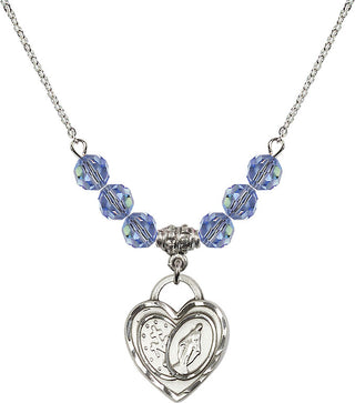 18" Rhodium Plated Necklace with 4mm Light Sapphire Crystal Beads featuring a Sterling Silver Miraculous Heart Medal.