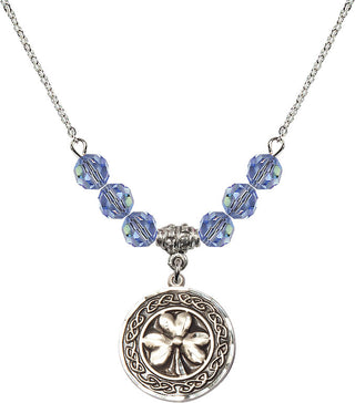 18" Rhodium Plated Necklace with 4mm Light Sapphire Crystal Beads featuring a Sterling Silver Shamrock with Celtic Border Medal.