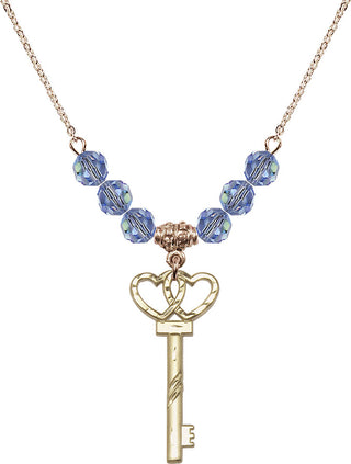 18" Hamilton Gold Plated Necklace with 4mm Light Sapphire Crystal Beads featuring a 14kt Gold Filled Small Key w/Double Hearts Medal.